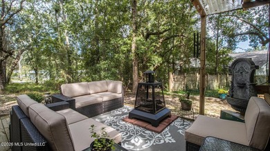 Located in the heart of Diamondhead, this spacious home sits on - photo 35