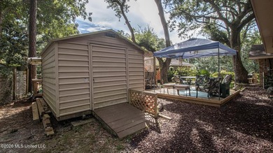 Located in the heart of Diamondhead, this spacious home sits on - photo 37