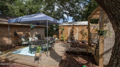 Located in the heart of Diamondhead, this spacious home sits on - photo 39