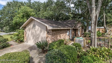 Located in the heart of Diamondhead, this spacious home sits on - photo 41