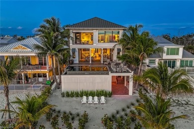 Experience beachfront living at its finest in this stunning - photo 2