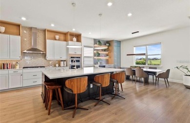 Experience luxury living in the beautiful , gated Bella Collina - photo 5