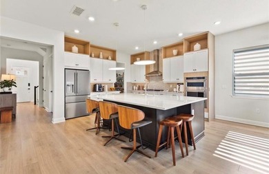 Experience luxury living in the beautiful , gated Bella Collina - photo 7