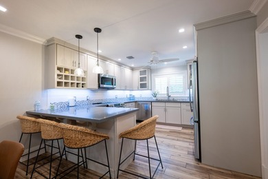 Island living is effortless in this exceptional 3-bedroom - photo 9