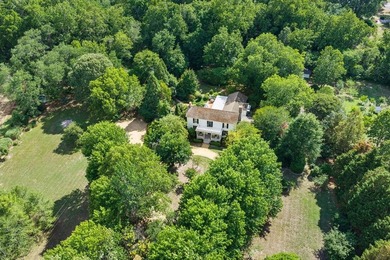 Privately nestled on approximately 10 picturesque acres at the - photo 1