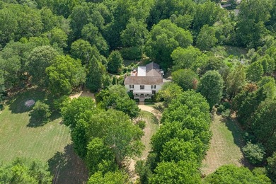 Privately nestled on approximately 10 picturesque acres at the - photo 2