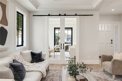 This newly constructed masterpiece in Manhattan Beach offers 6