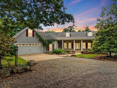 Tucked away in the Ozarks on 40 breathtaking acres, this - photo 1