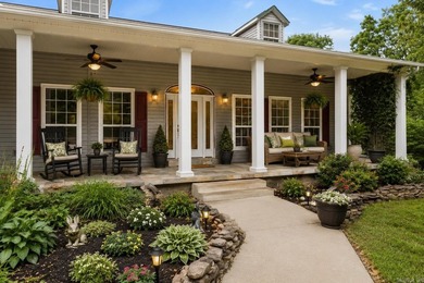 Tucked away in the Ozarks on 40 breathtaking acres, this - photo 4