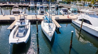 Great opportunity to own a 60' x 20' deep-water boat slip in the - photo 6