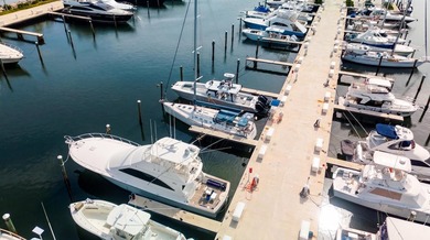 Great opportunity to own a 60' x 20' deep-water boat slip in the - photo 7