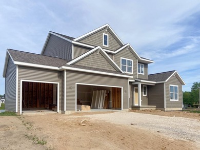 Welcome to your next dream home in Allendale, Michigan -- a - photo 2