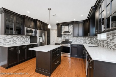 Welcome to this beautifully maintained semi-attached home in the - photo 11