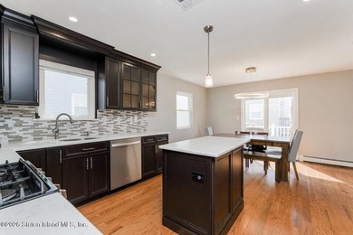 Welcome to this beautifully maintained semi-attached home in the - photo 12