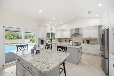 Vaulted ceilings and sunlit interiors define this elegant - photo 15