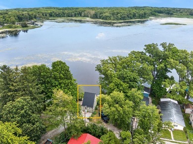 Tucked along the peaceful shores of Backwater Lake, this - photo 2