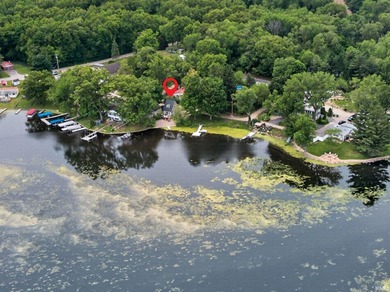 Tucked along the peaceful shores of Backwater Lake, this - photo 3