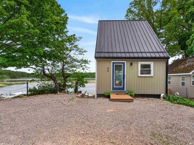 Tucked along the peaceful shores of Backwater Lake, this - photo 4
