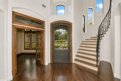 Nestled within the prestigious gated neighborhood of The - photo 4