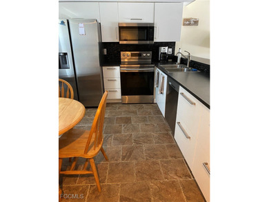 First floor unit available with gulf access.Only one bridge to - photo 4
