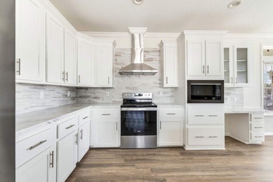 The Azalea, a premier coastal cottage, designed by an - photo 6