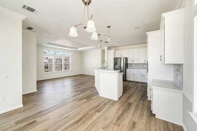 The Azalea, a premier coastal cottage, designed by an - photo 7