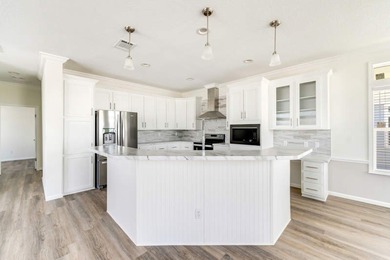The Azalea, a premier coastal cottage, designed by an - photo 8