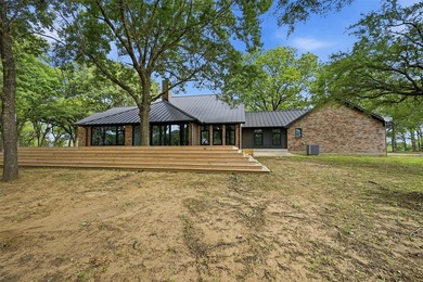 Set on 11 gently rolling acres in Sadler, TX, this beautifully - photo 31