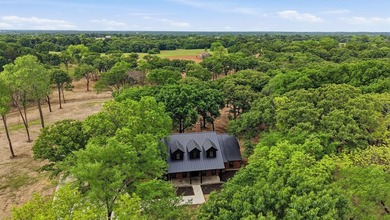 Set on 11 gently rolling acres in Sadler, TX, this beautifully - photo 34