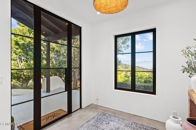 Perched high above the Malibu coast and canyons, Mulholland - photo 18