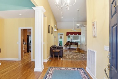 Set among mature trees on a quiet street, this brick traditional - photo 4
