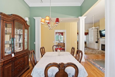Set among mature trees on a quiet street, this brick traditional - photo 5