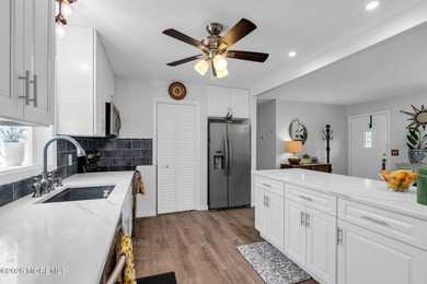 Brick's highly desirable Lake Riviera offers this expanded 3 - photo 9