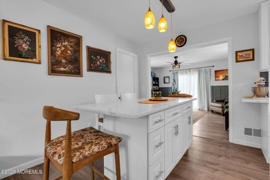 Brick's highly desirable Lake Riviera offers this expanded 3 - photo 10