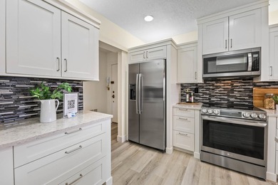 Rarely available top-floor 3-bedroom condo in sought-after