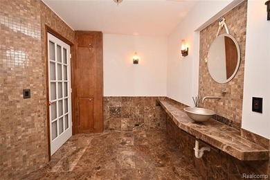 Welcome to this landmark stone home, situated on a large corner - photo 23