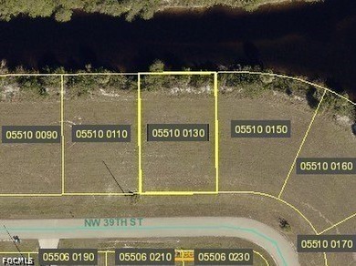 This vacant WATERFRONT residential lot, located at 3809 NW 39th - photo 1