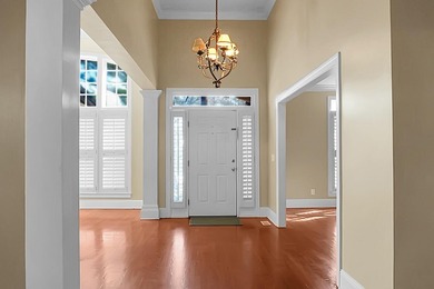 Welcome to luxury living in the highly sought-after gated - photo 7
