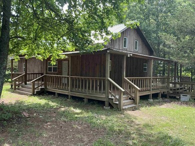 LAKEFRONT CABIN WITH 2 STALL PRIVATE DOCK & approx. 242 feet of - photo 2