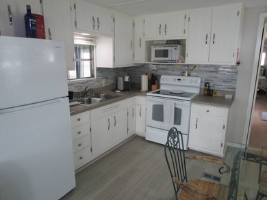 This beautiful turnkey 2 bedroom, 2 bath home is located in the - photo 9