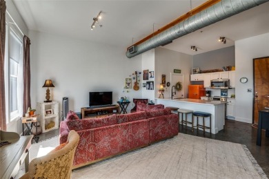 Rare opportunity to own an extensively updated loft style condo