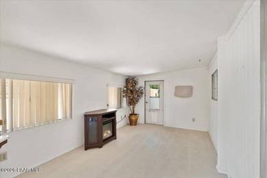Improved Price! Enjoy low-maintenance living in this updated - photo 13