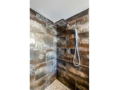 Rare opportunity to own an extensively updated loft style condo