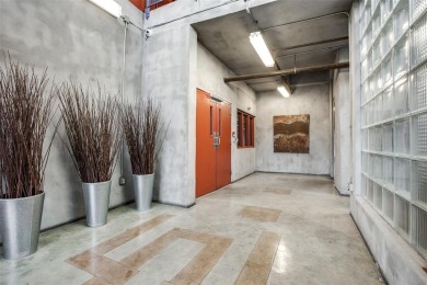 Rare opportunity to own an extensively updated loft style condo
