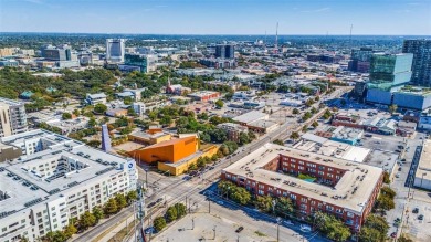 Rare opportunity to own an extensively updated loft style condo