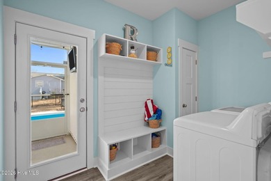 This almost new 2023 pristine open floor-plan beach home - photo 29