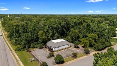 Prime commercial property offering outstanding exposure and - photo 6