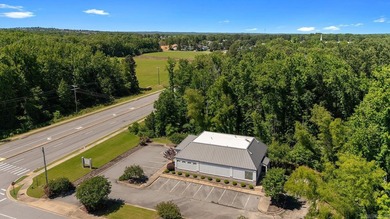 Prime commercial property offering outstanding exposure and - photo 7