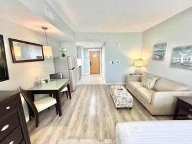 Beautifully perched on the seventh floor, this light and airy - photo 15