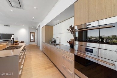 Set against the dramatic backdrop of Camelback Mountain, with